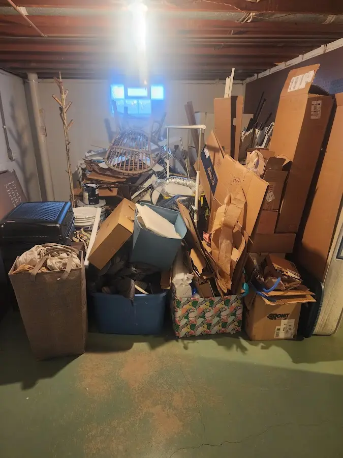 Roll-off dumpster container at job site for Concrete Dumpster Rental in Golden Beach